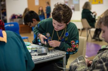 Cub making jewellery